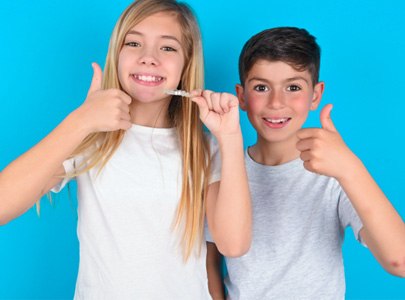 Patient in Cary smiling with Invisalign Teen